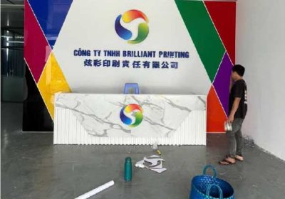Thiết Kế & Thi Công Vách Logo, Quầy Lễ Tân Cho Công Ty TNHH Brilliant Printing