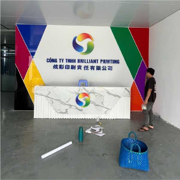 Thiết Kế & Thi Công Vách Logo, Quầy Lễ Tân Cho Công Ty TNHH Brilliant Printing