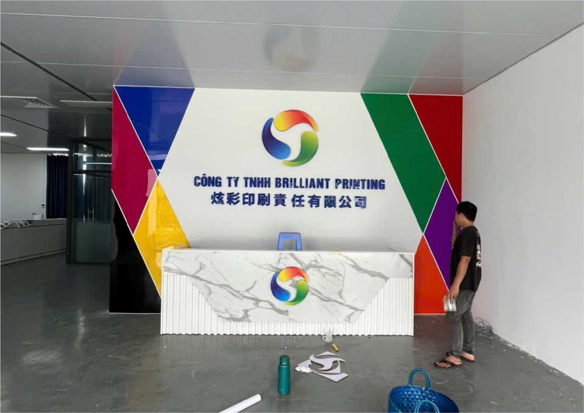 Thiết Kế & Thi Công Vách Logo, Quầy Lễ Tân Cho Công Ty TNHH Brilliant Printing